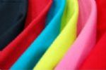 Hot melt adhesive coated reflective film back